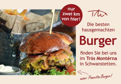 Plakatmotiv des Restaurants Trós Montérna in Schwanstetten mit Nahaufnahme eines Burgers. Hinweis auf hausgemachte Burger und Nähe zum Standort (nur 2 km entfernt).