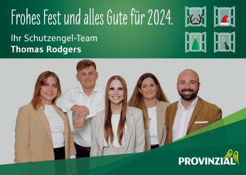 Weihnachtliches Plakatmotiv der Provinzial-Agentur Thomas Rodgers mit Teamfoto und Grußbotschaft für das Jahr 2024.